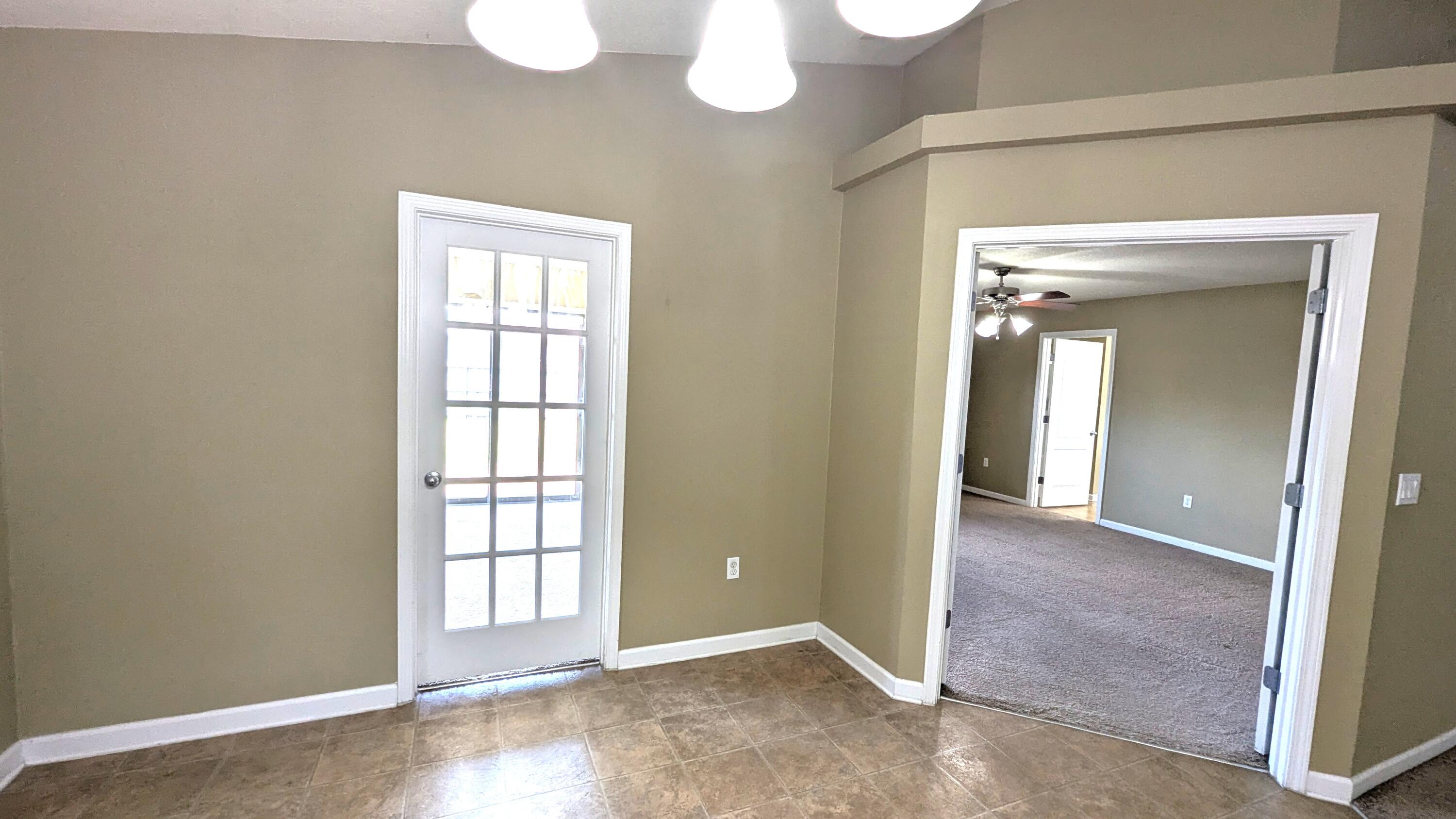 7976 Promise Creek Road Navarre, FL 32566 - Photo 19 of 29 an empty room that has a window