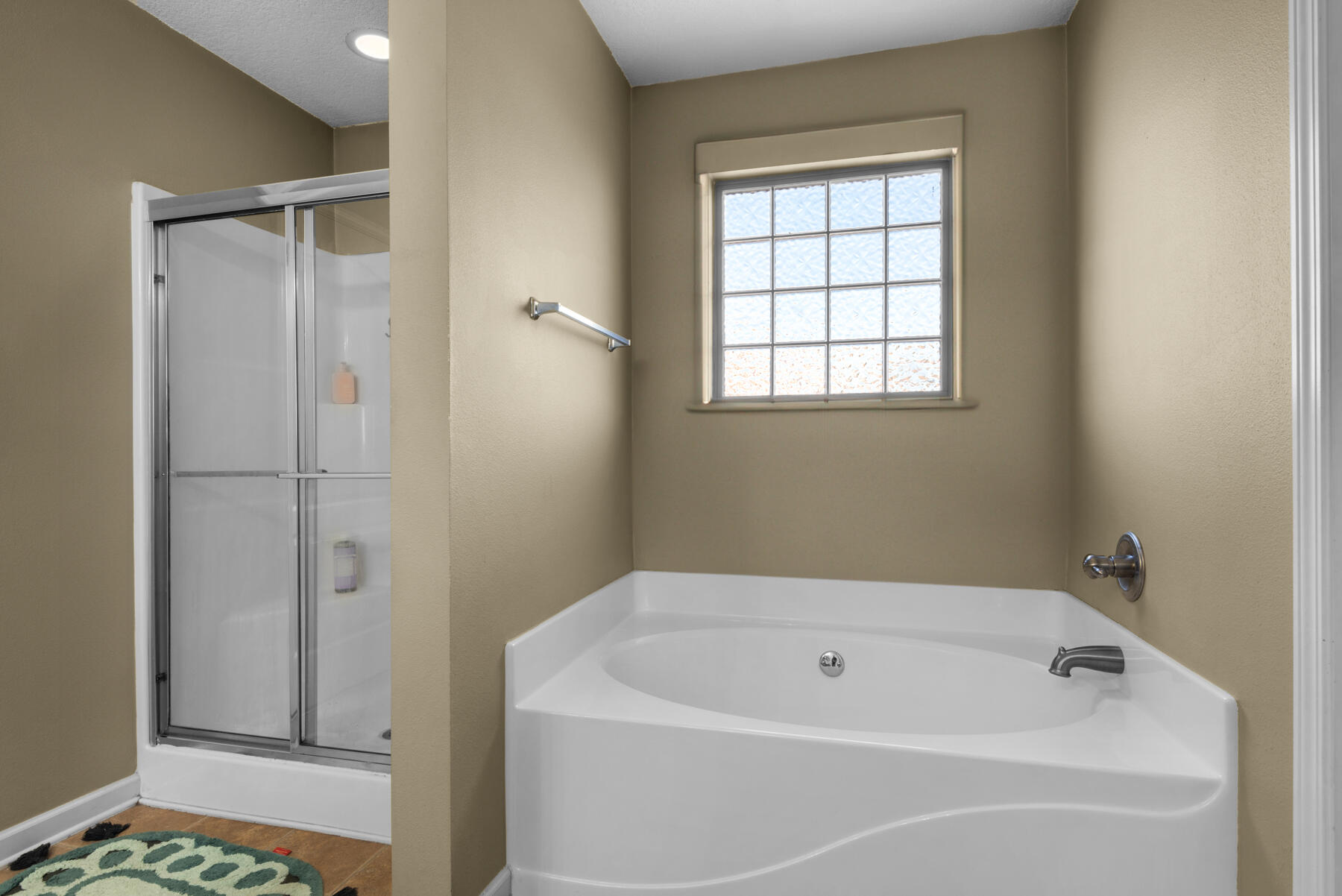 7976 Promise Creek Road Navarre, FL 32566 - Photo 24 of 29 a white bath tub sitting next to a window