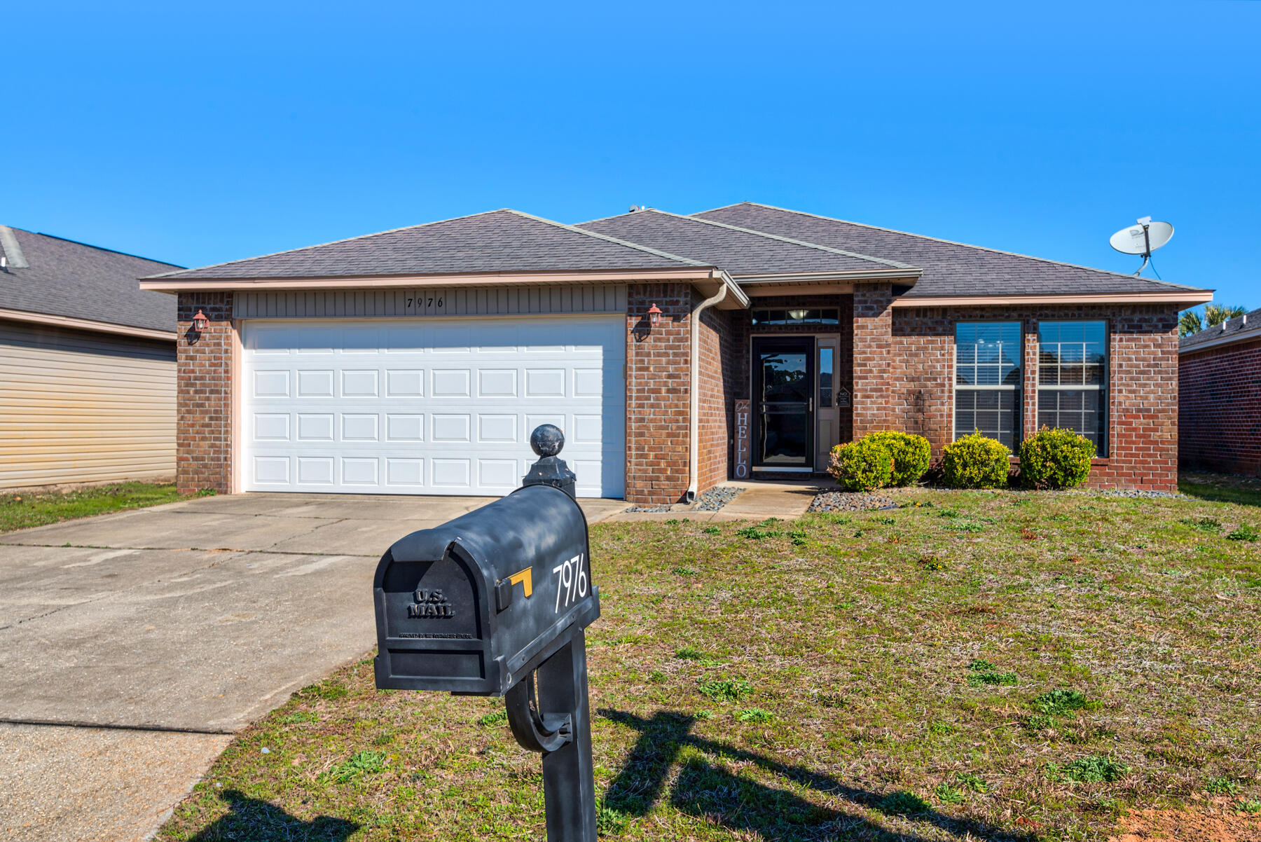 7976 Promise Creek Road Navarre, FL 32566 - Photo 3 of 29 a view of a house with backyard and sitting area
