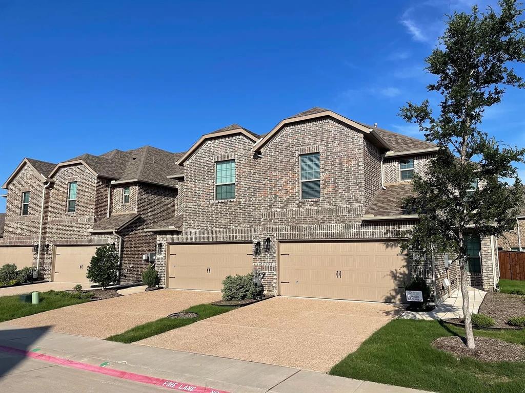 View of front of home featuring a garage