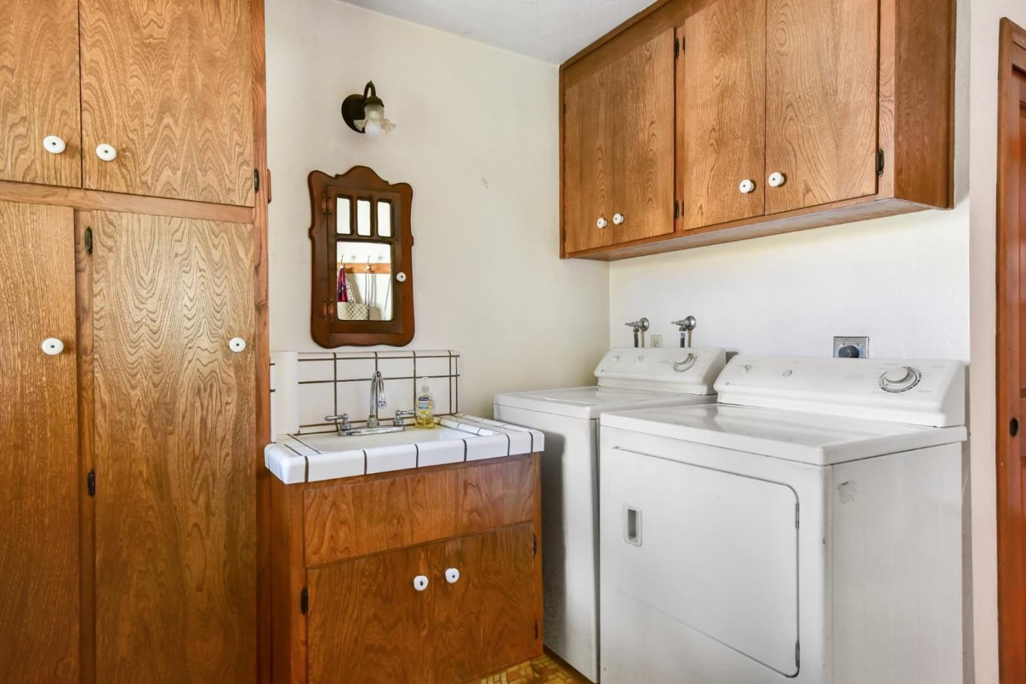 3385 Hecker Pass Road Gilroy, CA 95020 - Photo 9 of 18 a bathroom with a sink and a mirror