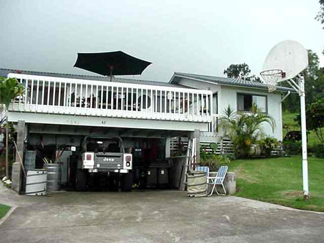 68 Maukanani Road Kula, HI 96790 - Photo 1 of 8 a front view of a house with garden