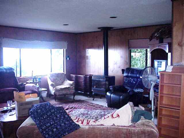 68 Maukanani Road Kula, HI 96790 - Photo 2 of 8 a living room with furniture and a large window