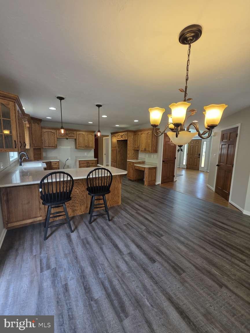 798 Menges Mills Road Spring Grove, PA 17362 - Photo 13 of 50 a living room with furniture and a chandelier