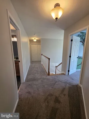 a view of a livingroom with a staircase