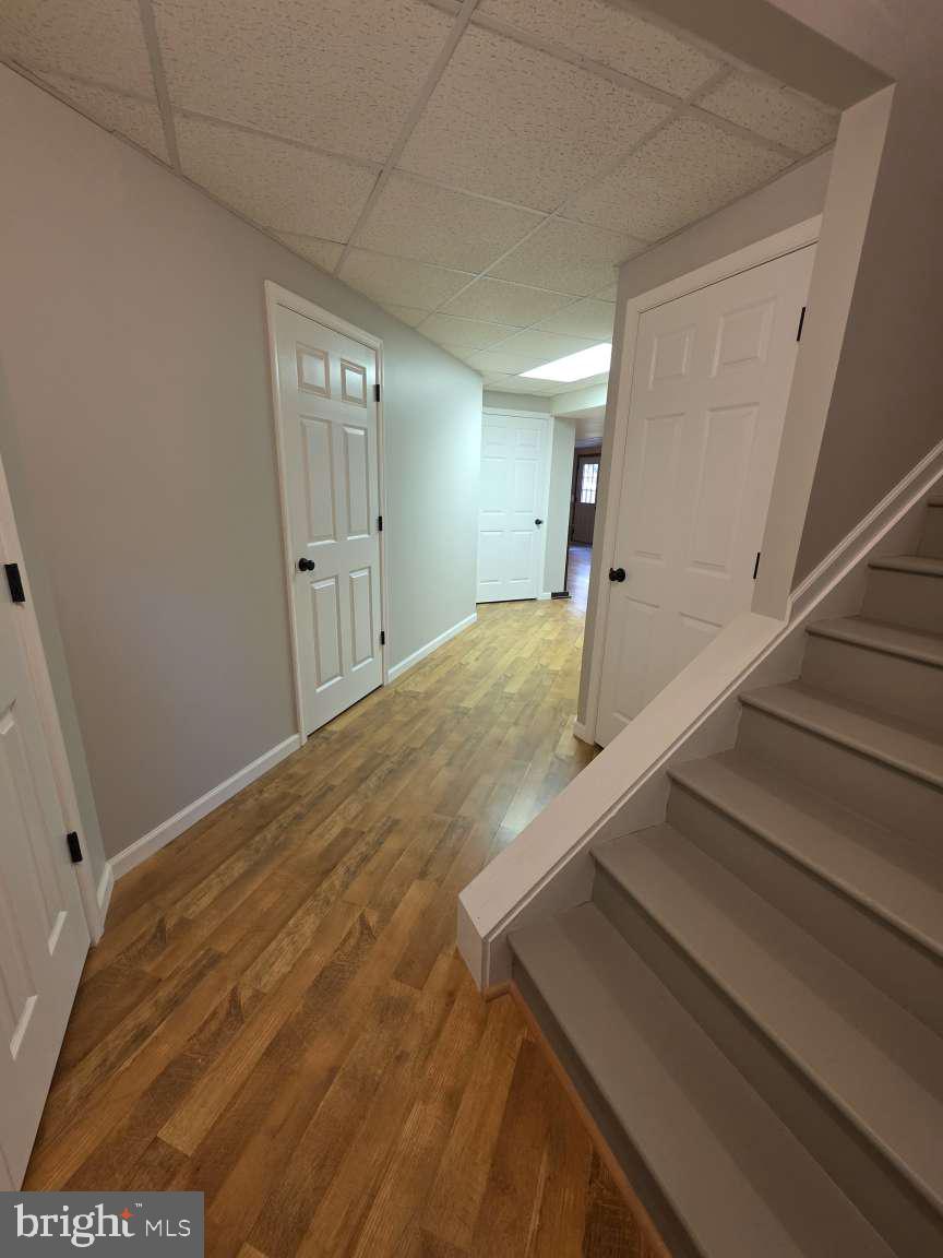 798 Menges Mills Road Spring Grove, PA 17362 - Photo 48 of 50 a view of a hallway with wooden floor and staircase