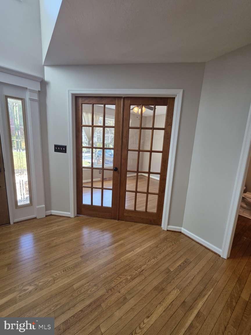 798 Menges Mills Road Spring Grove, PA 17362 - Photo 6 of 50 a view of an empty room with wooden floor and a window