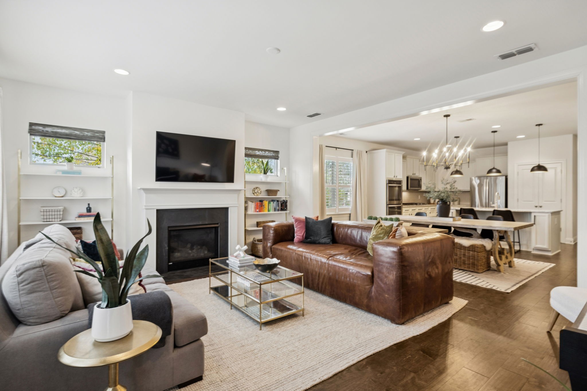 2000 Nolencrest Drive Franklin, TN 37067 - Photo 13 of 52 a living room with furniture kitchen view and a fireplace