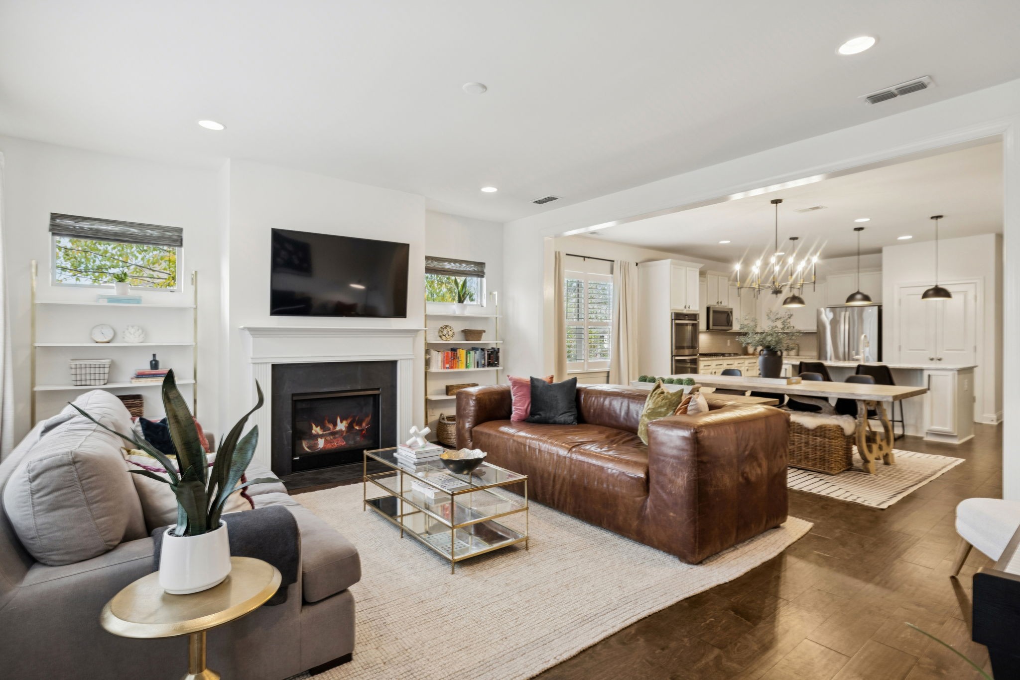 2000 Nolencrest Drive Franklin, TN 37067 - Photo 15 of 52 a living room with furniture kitchen view and a fireplace