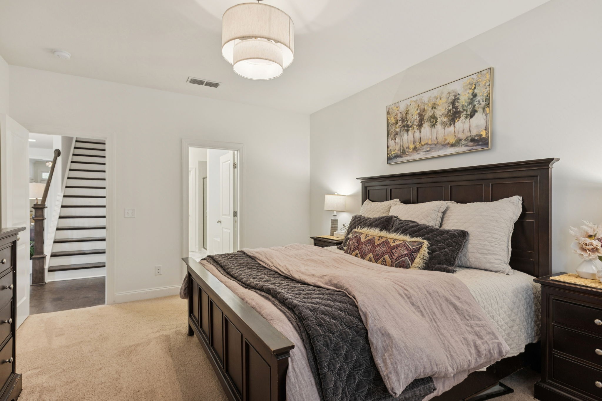 2000 Nolencrest Drive Franklin, TN 37067 - Photo 17 of 52 a bedroom with a bed and a painting on the wall