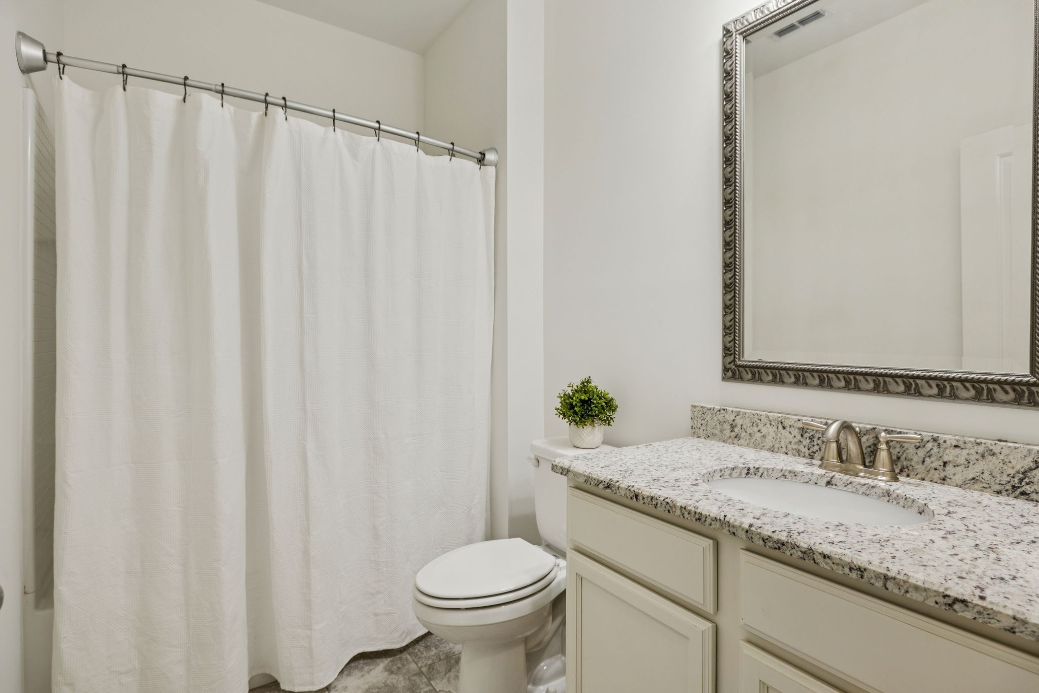 2000 Nolencrest Drive Franklin, TN 37067 - Photo 27 of 52 a bathroom with a granite countertop sink and a mirror