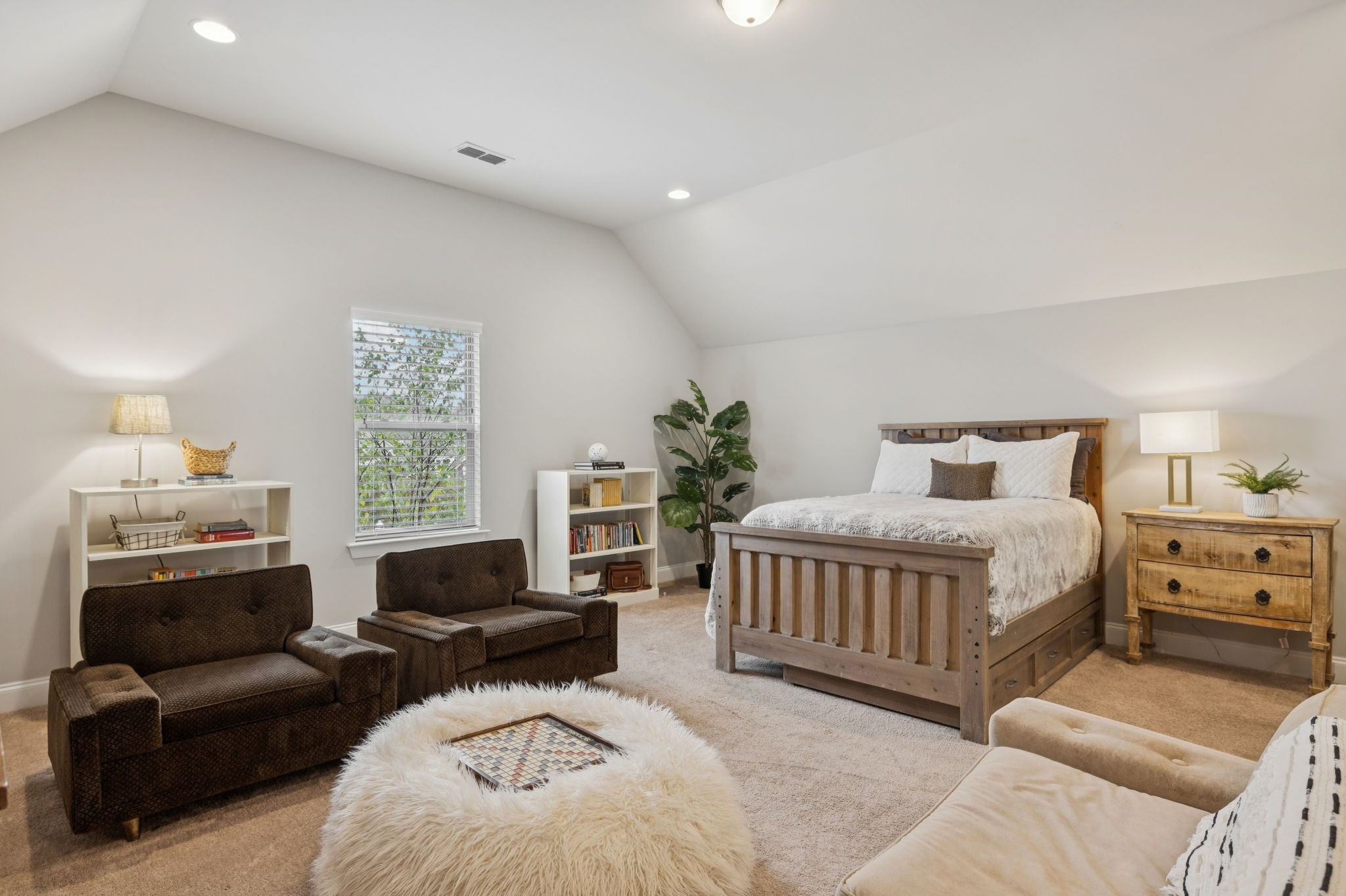 2000 Nolencrest Drive Franklin, TN 37067 - Photo 29 of 52 a spacious bedroom with a bed and a couch