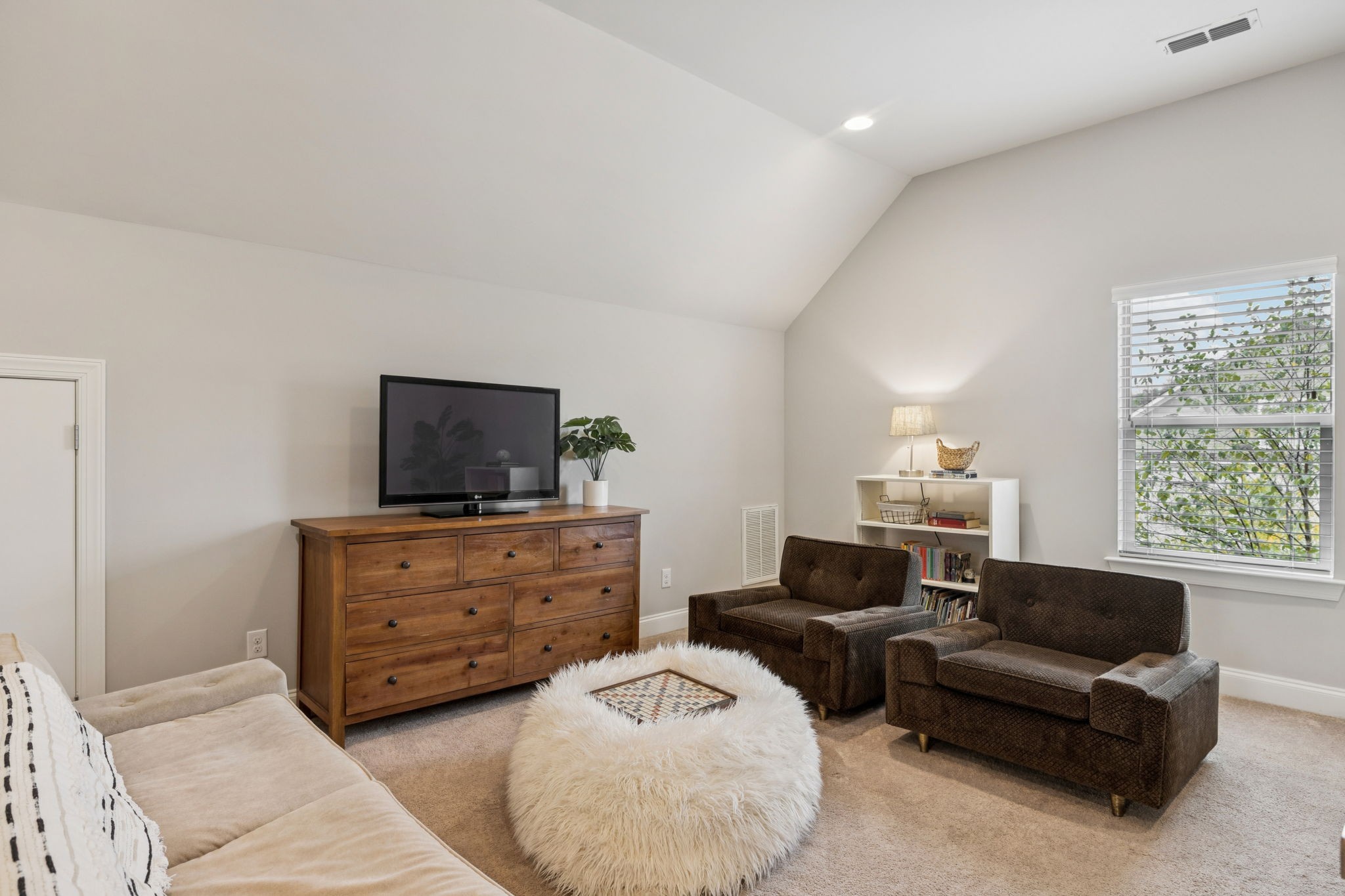 2000 Nolencrest Drive Franklin, TN 37067 - Photo 30 of 52 a living room with furniture and a flat screen tv