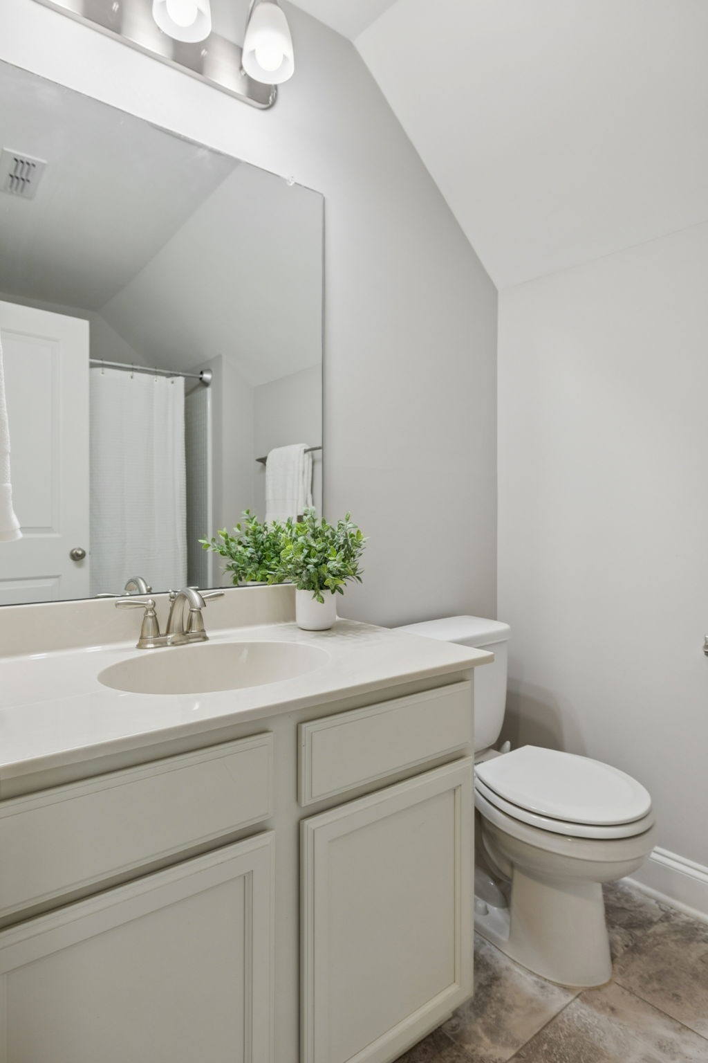 2000 Nolencrest Drive Franklin, TN 37067 - Photo 33 of 52 a bathroom with a toilet a sink and mirror
