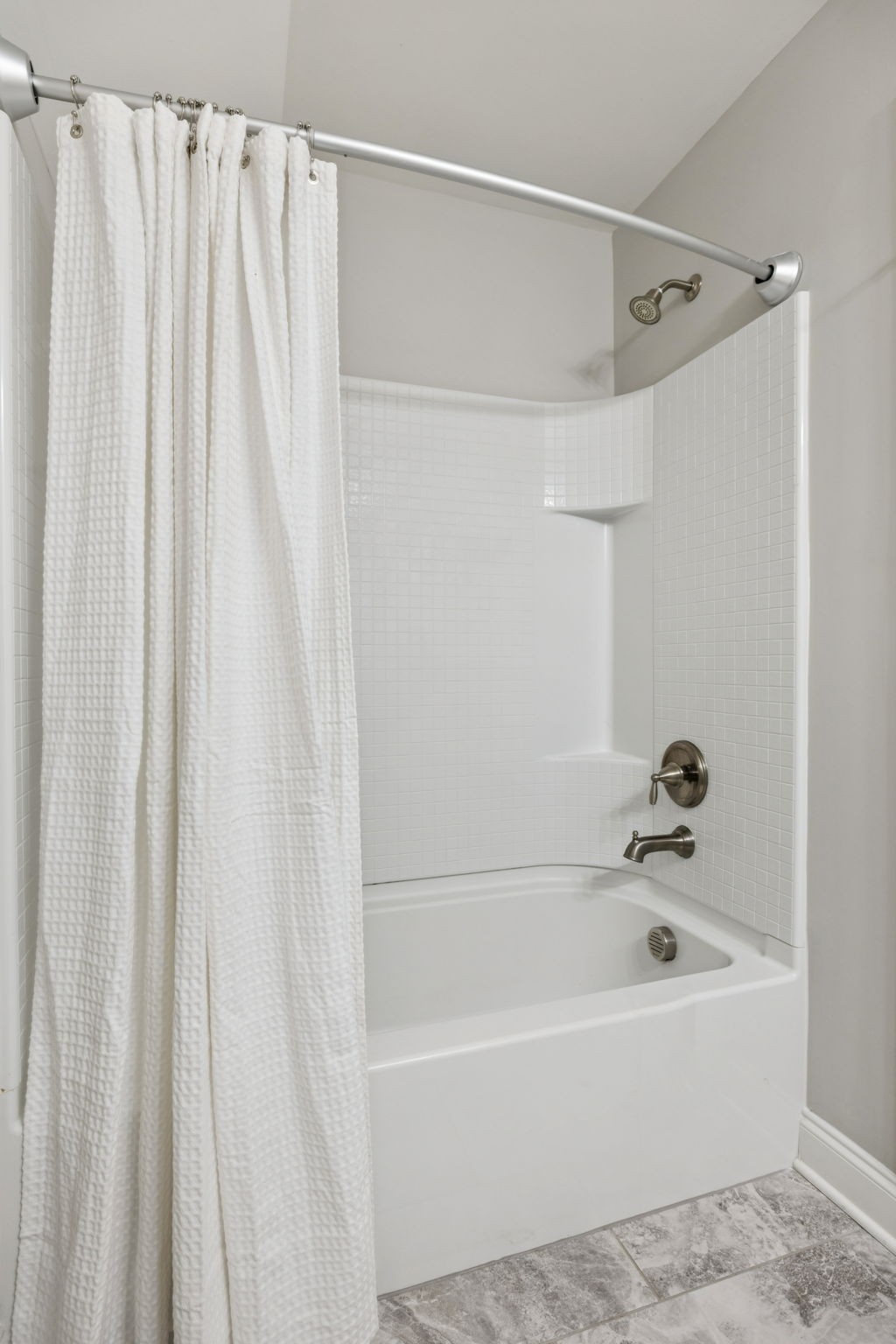 2000 Nolencrest Drive Franklin, TN 37067 - Photo 34 of 52 a bathroom with a shower and a bathtub
