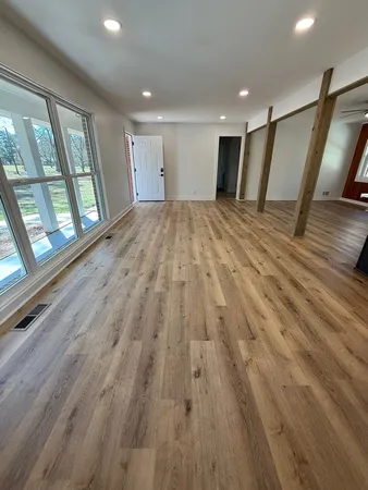 a view of entryway with wooden floor