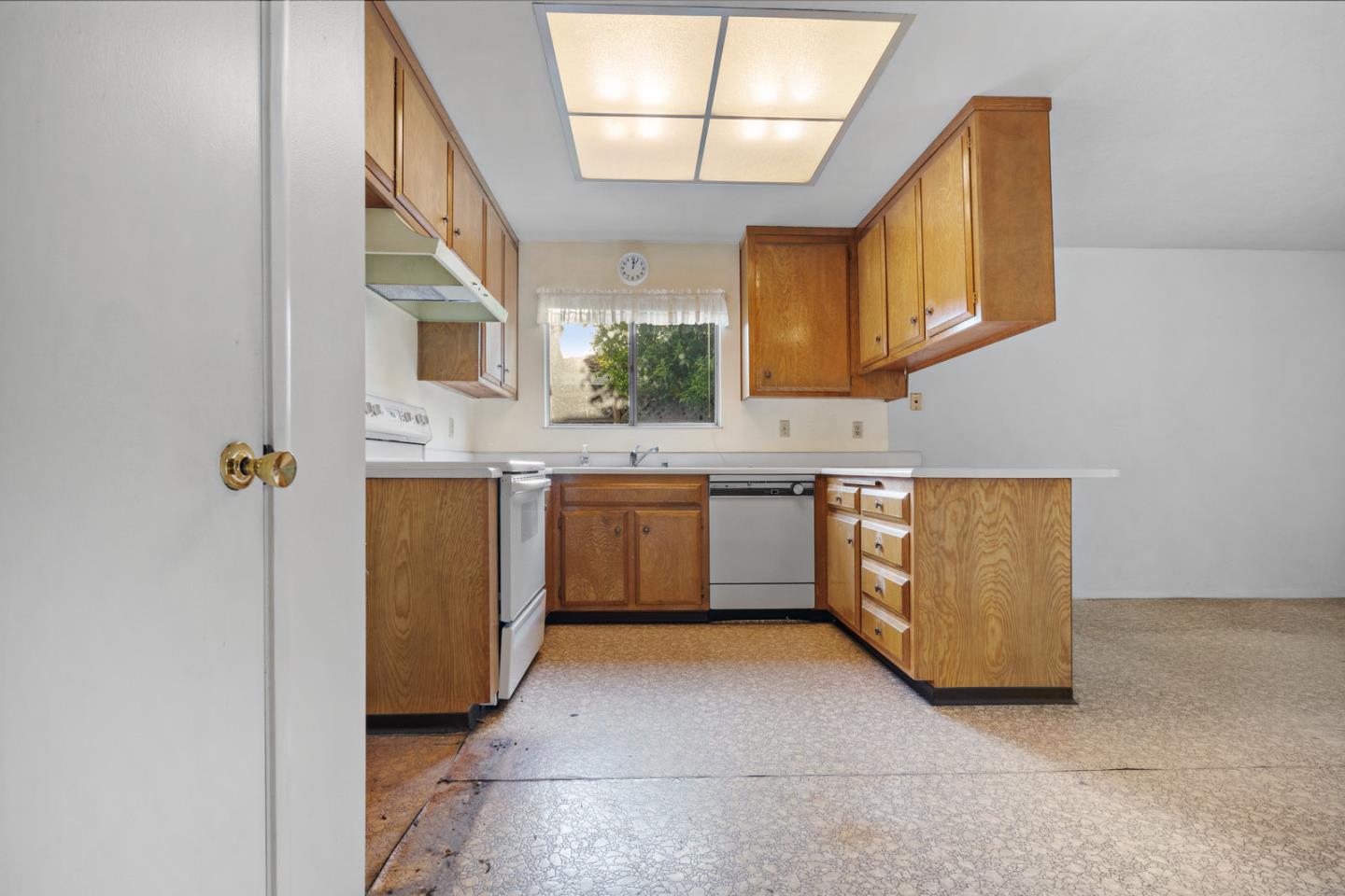 503 Paiute Lane San Jose, CA 95123 - Photo 4 of 18 a utility room with cabinets dryer and washer