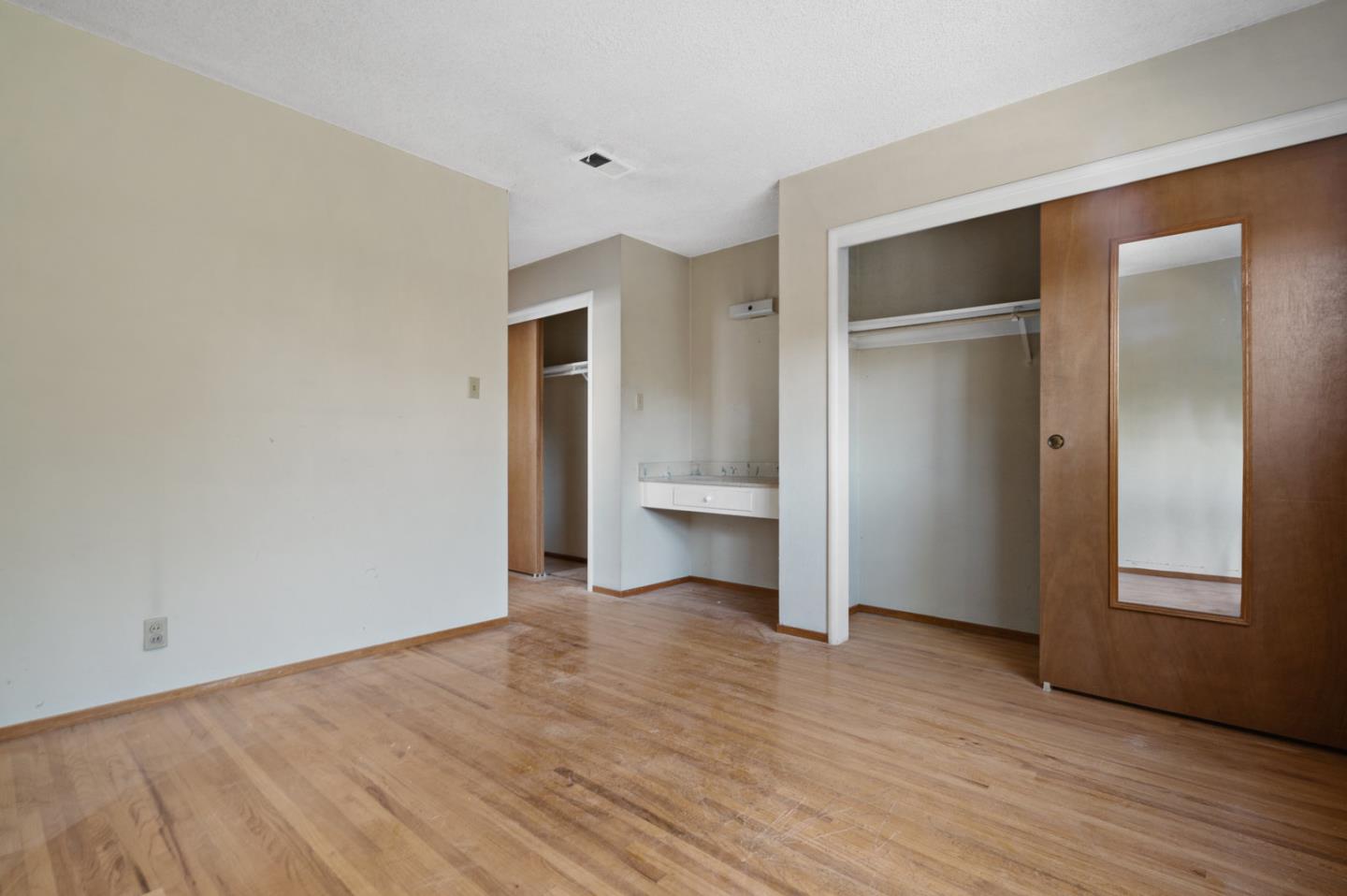 503 Paiute Lane San Jose, CA 95123 - Photo 6 of 18 a view of empty room with wooden floor