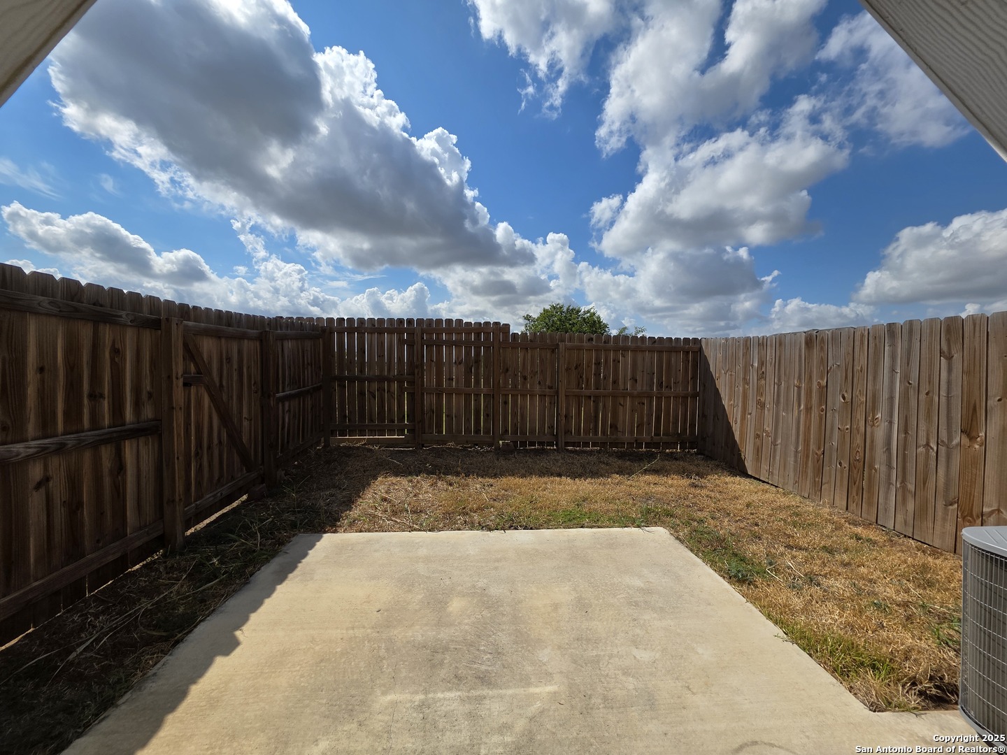 8410 Flicka Hills, Unit 2 Selma, TX 78154 - Photo 19 of 19 a view of wooden fence