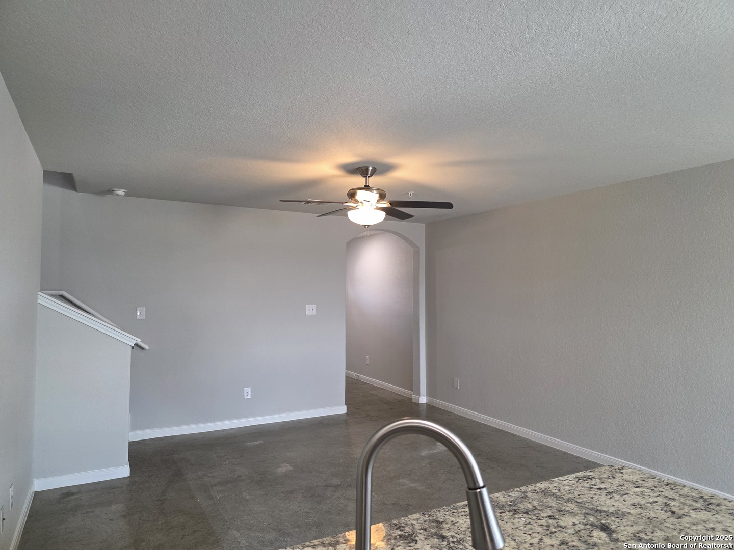 8410 Flicka Hills, Unit 2 Selma, TX 78154 - Photo 5 of 19 a view of a livingroom with a chandelier fan