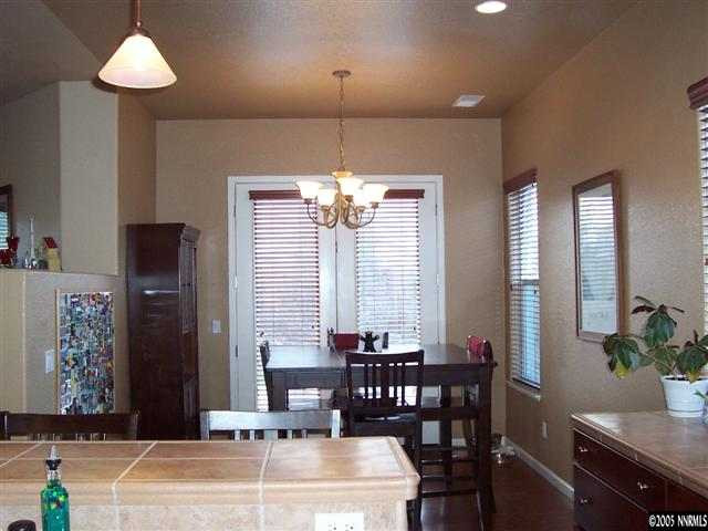 1680 Gulch Way Reno, NV 89521 - Photo 5 of 9 a dining room with furniture and window