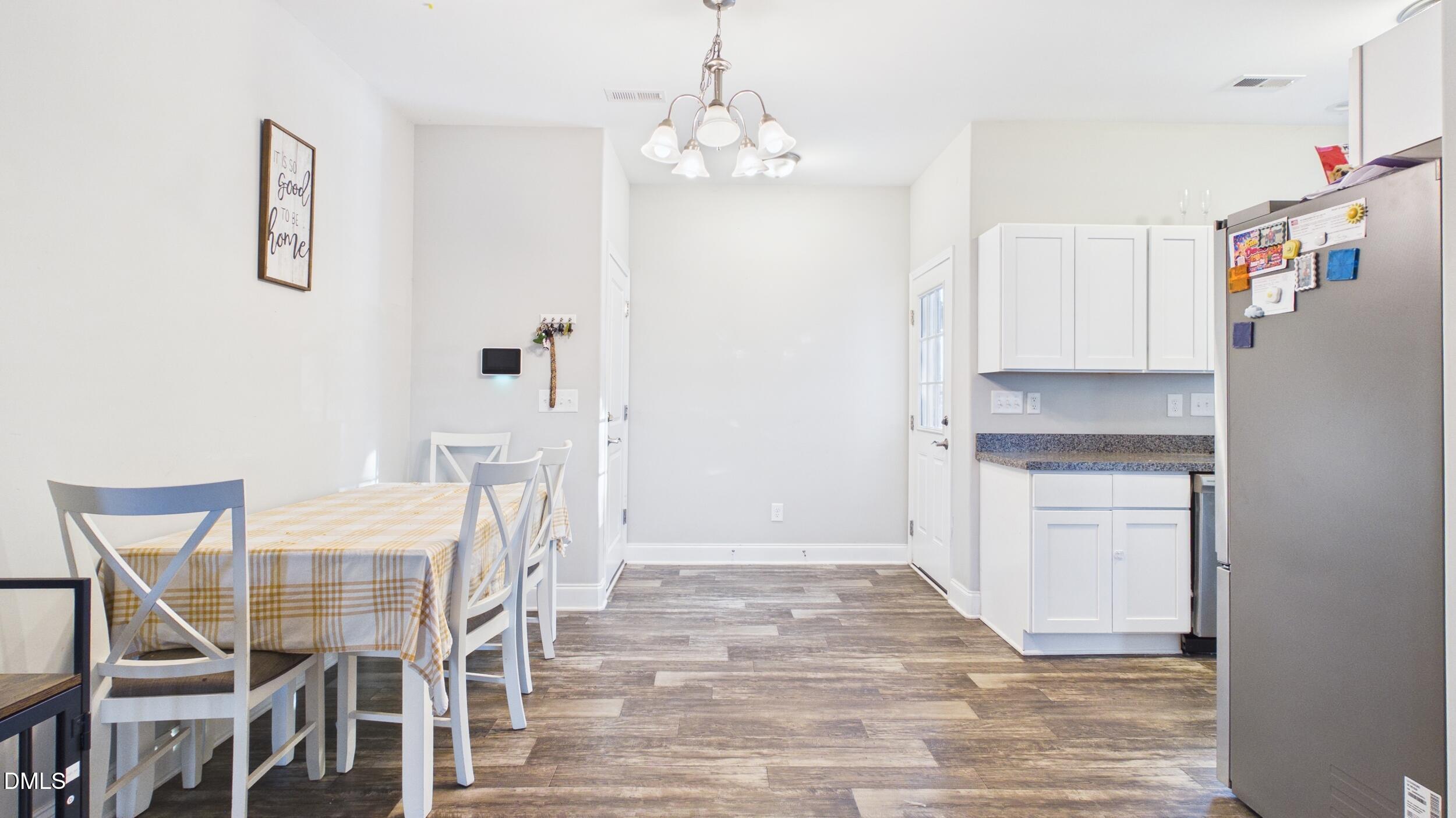 5930 Old 421 Road Liberty, NC 27298 - Photo 8 of 42 a kitchen with stainless steel appliances granite countertop a refrigerator and microwave