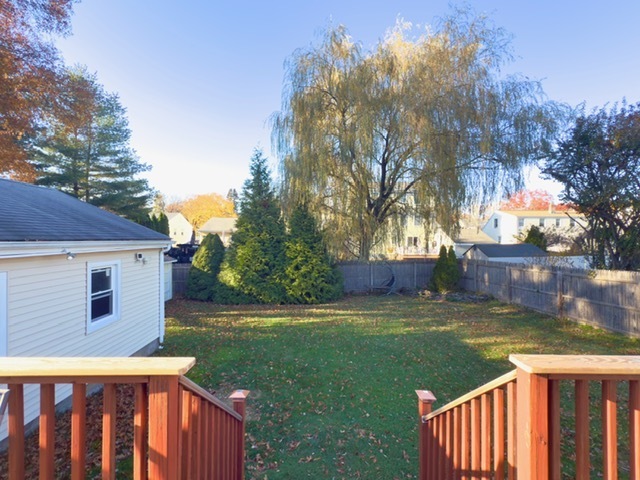 270 Andrassy Avenue Fairfield, CT 06824 - Photo 11 of 12 a view of a backyard with a garden