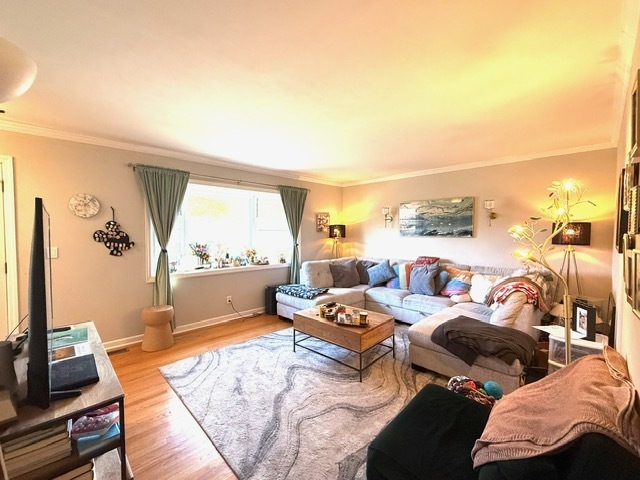 270 Andrassy Avenue Fairfield, CT 06824 - Photo 4 of 12 a living room with furniture and a flat screen tv