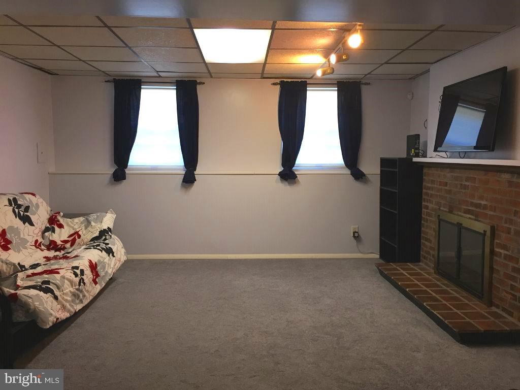 216 Compass Road Baltimore, MD 21221 - Photo 13 of 20 Awesome Lower Level Family Rm w/Fireplace