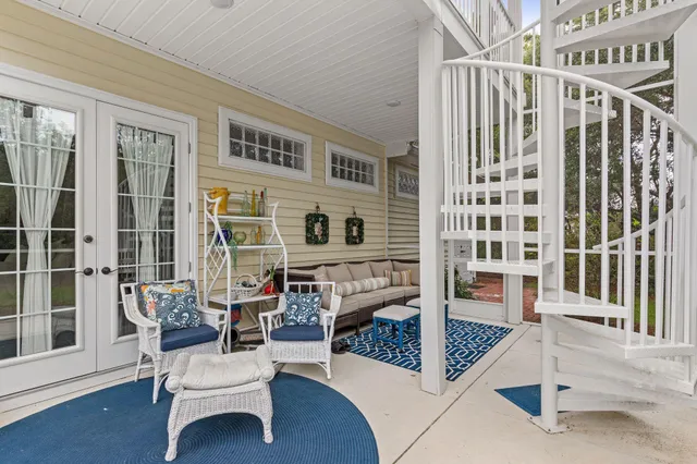 a kitchen with stainless steel appliances granite countertop a refrigerator a stove and a sink with cabinets