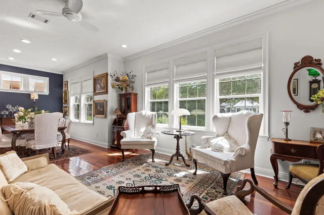 a living room with furniture and a table