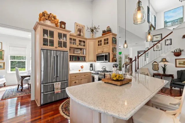 a spacious bedroom with a bed and a table