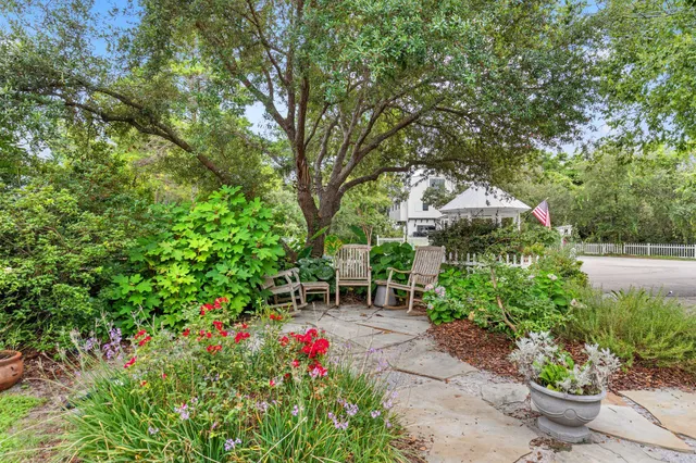 a garden view with a seating space