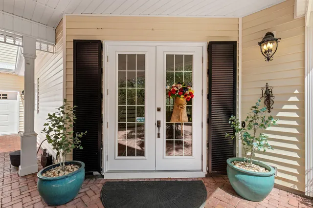 a view of entryway livingroom and hall with wooden floor