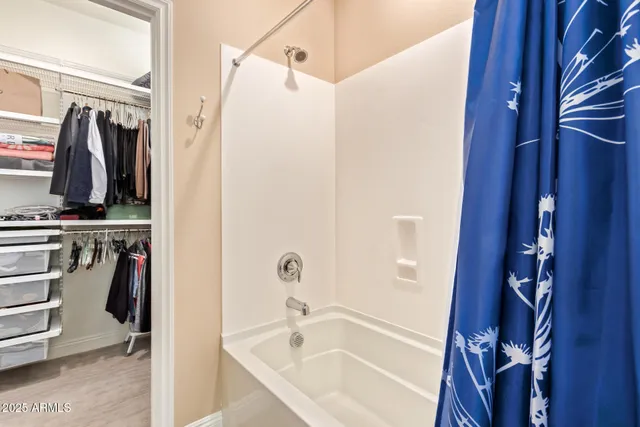 a view of a grassy field with an trees