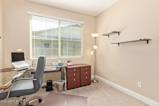 a view of a golf course with a lake