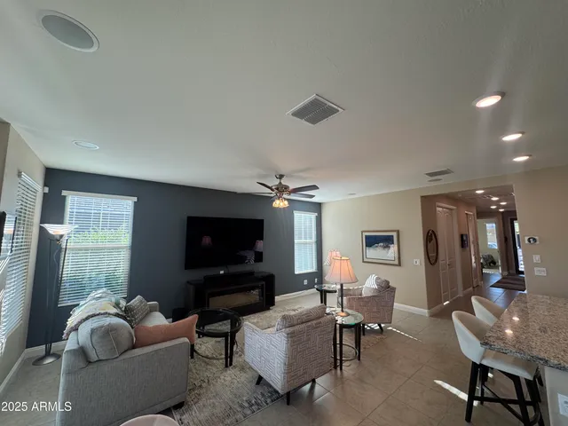 a view of a kitchen counter space and wooden floor
