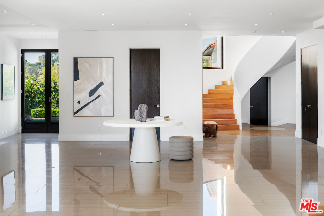 1280 Angelo Drive Beverly Hills, CA 90210 - Photo 11 of 66 a view of living room with furniture and window