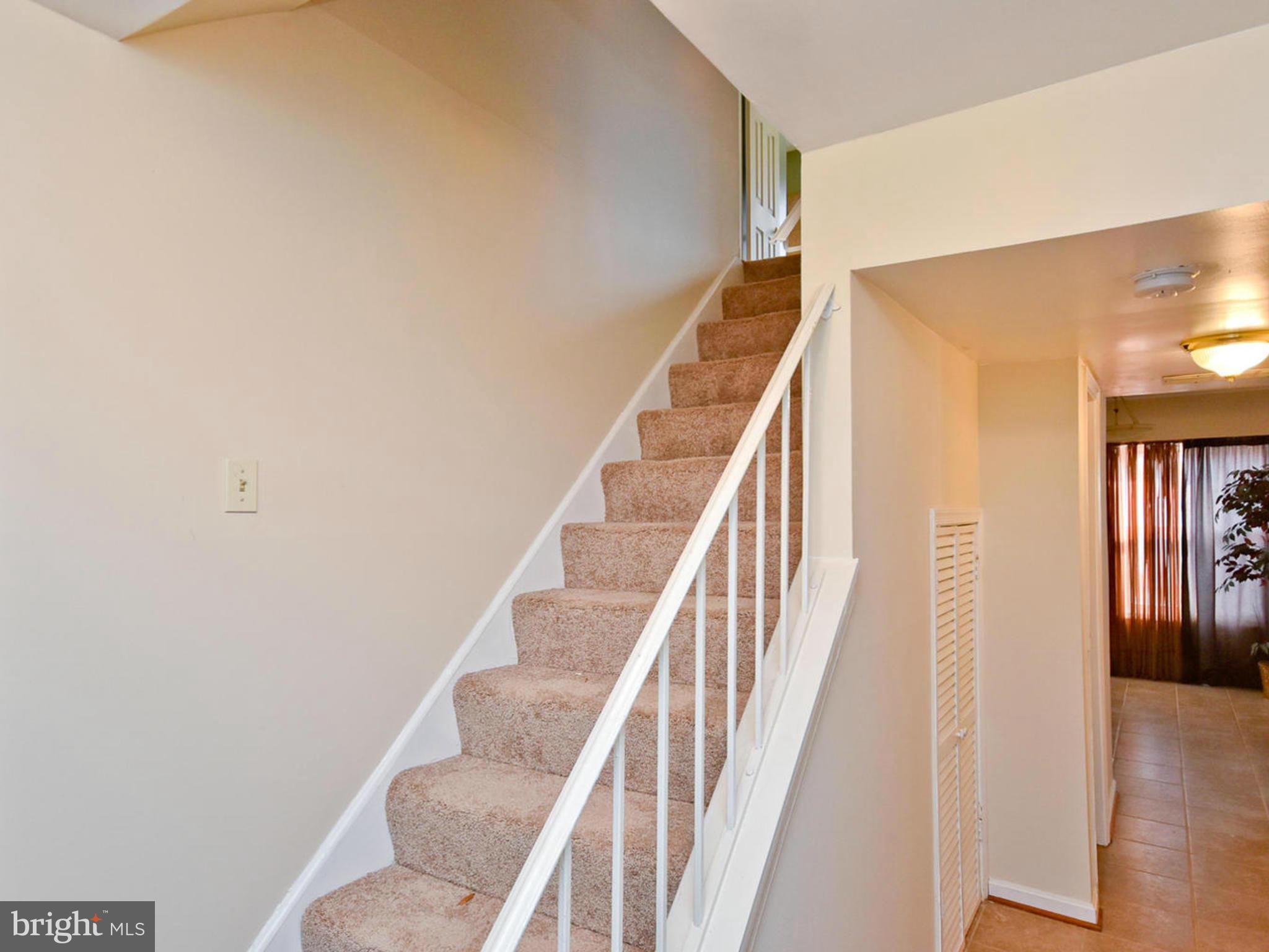 9114 Overlook Trail Fort Washington, MD 20744 - Photo 17 of 27 a view of entryway and hall with wooden floor