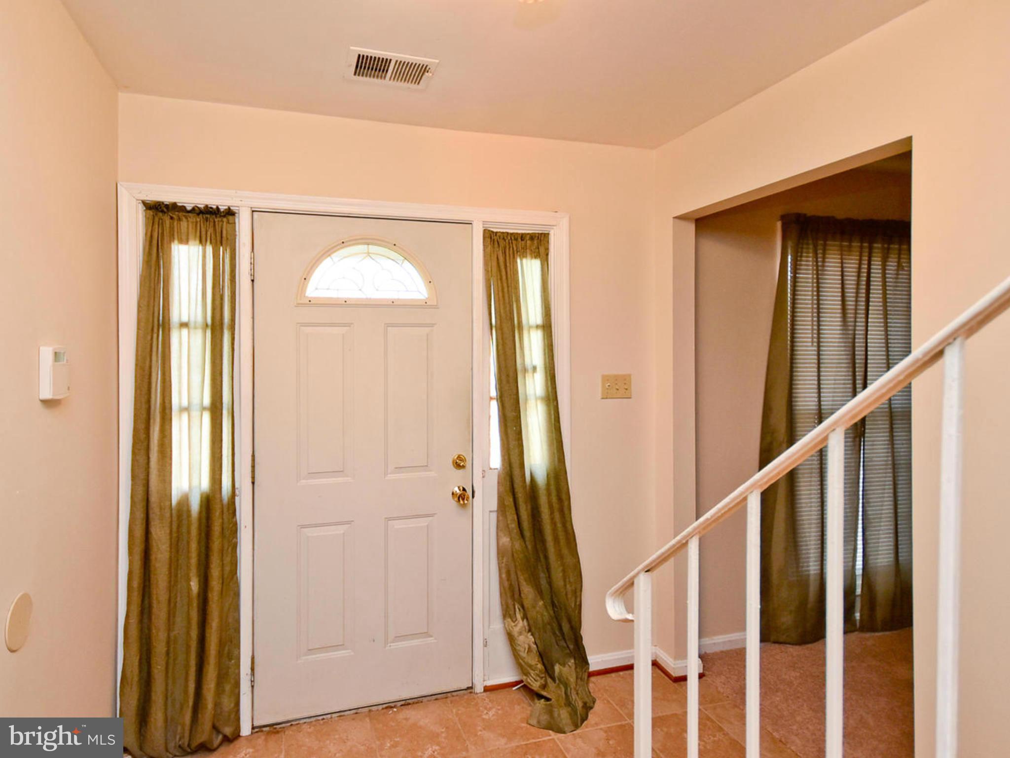 9114 Overlook Trail Fort Washington, MD 20744 - Photo 4 of 27 a view of an entryway with a livingroom