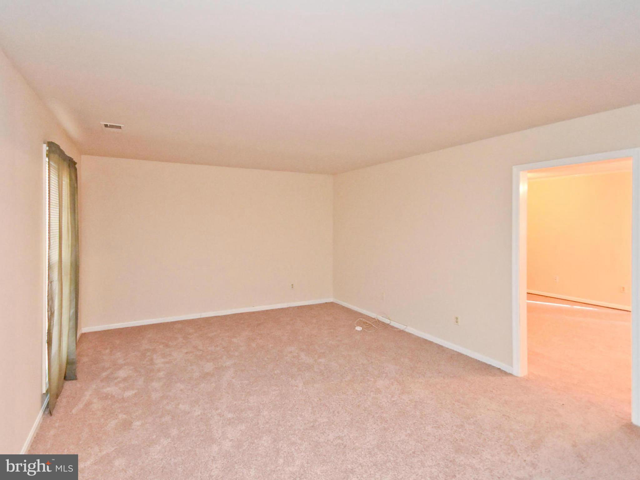 9114 Overlook Trail Fort Washington, MD 20744 - Photo 5 of 27 an empty room with a natural light