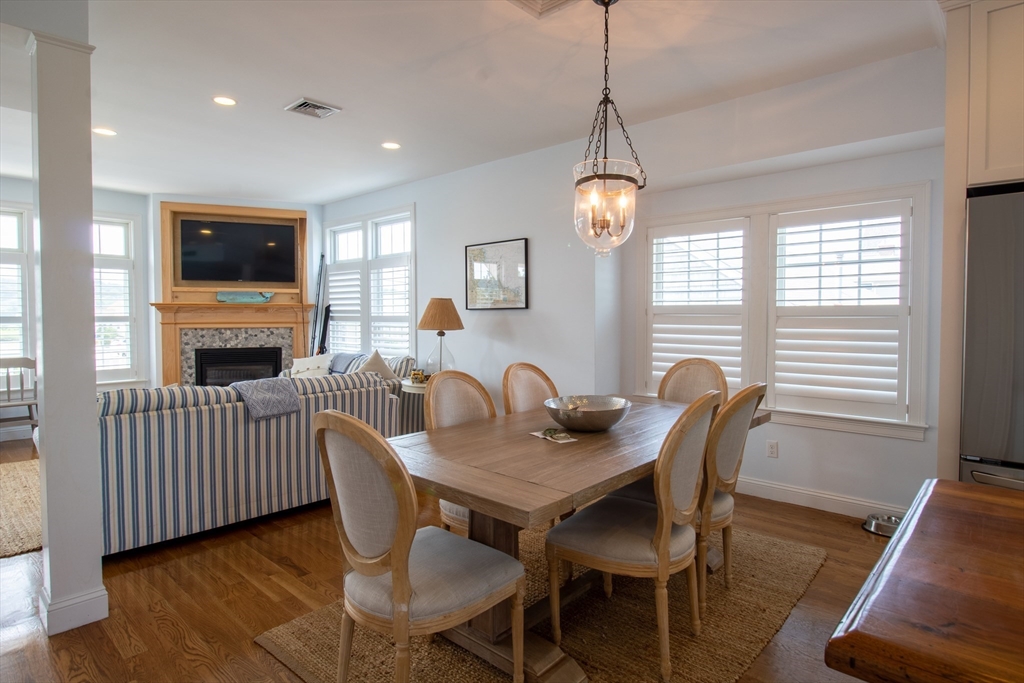117 River Street Scituate, MA 02050 - Photo 5 of 23 a view of a dining room with furniture window and wooden floor