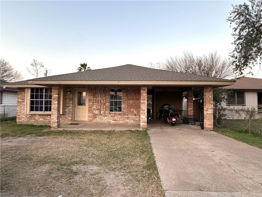 1210 West Frontage Road Alamo, TX 78516 - Photo 1 of 1 View of front of home featuring a carport