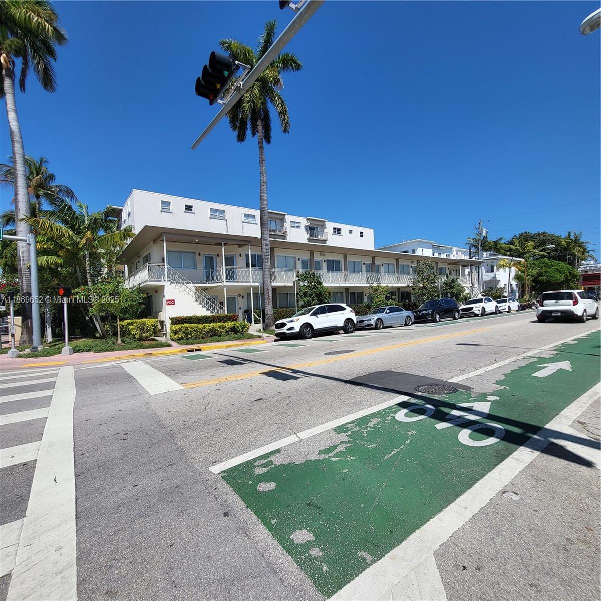 1601 Meridian Avenue, Unit 209 Miami Beach, FL 33139 - Photo 15 of 20 a view of a street with a building in the background