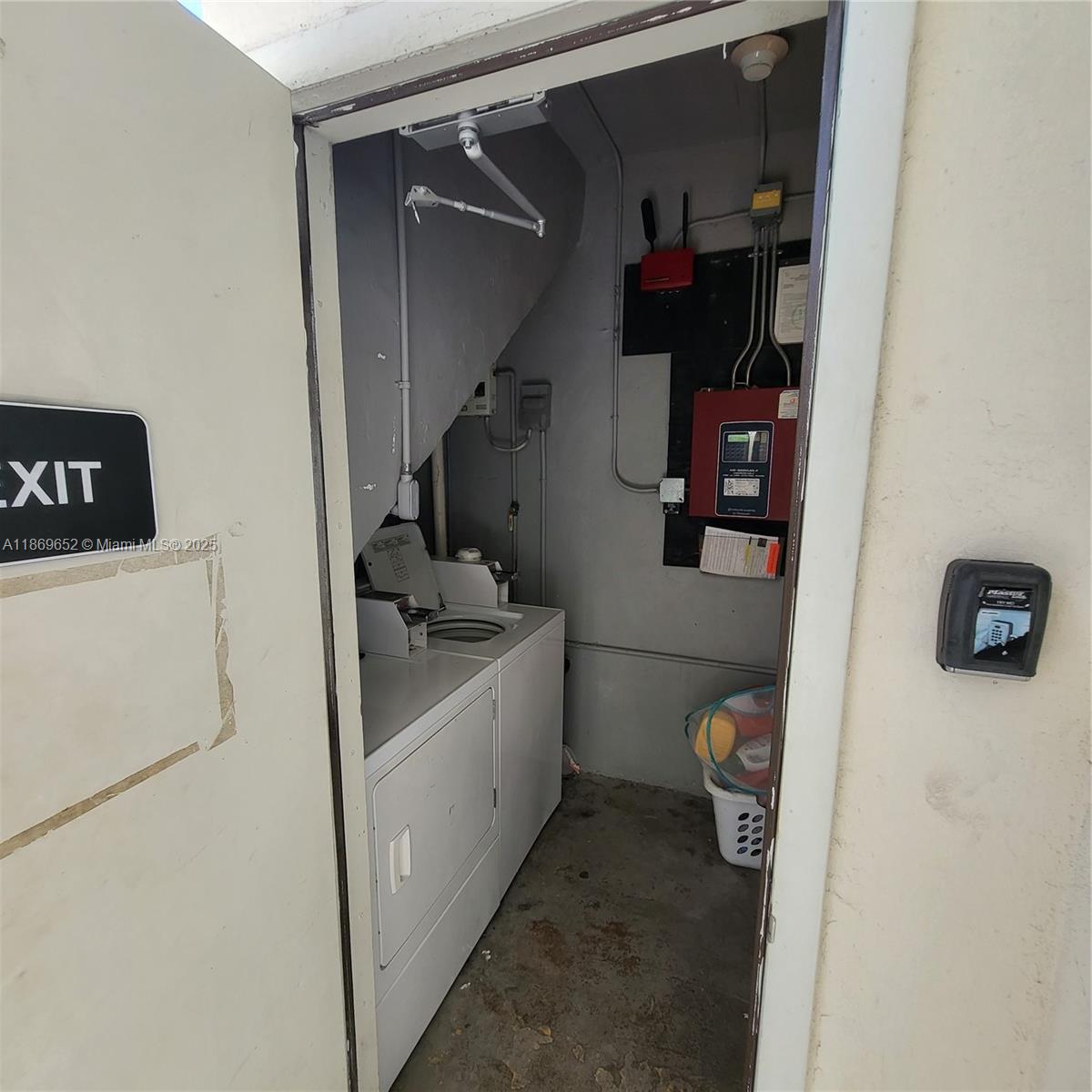 1601 Meridian Avenue, Unit 209 Miami Beach, FL 33139 - Photo 19 of 20 a utility room with dryer and washer