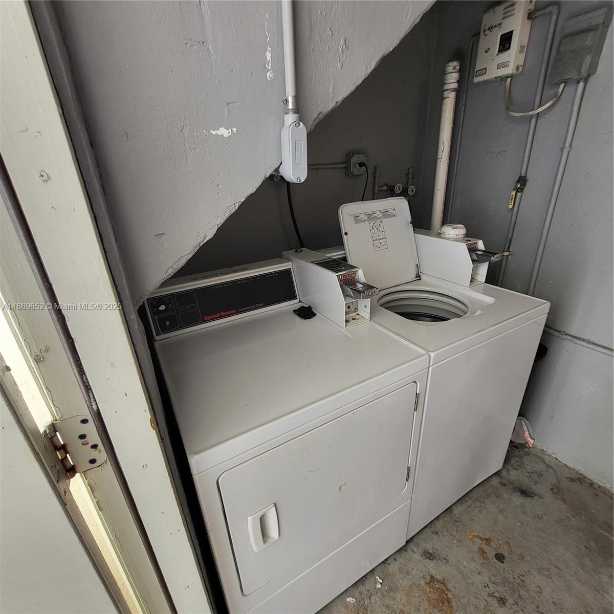 1601 Meridian Avenue, Unit 209 Miami Beach, FL 33139 - Photo 20 of 20 a utility room with dryer and washer