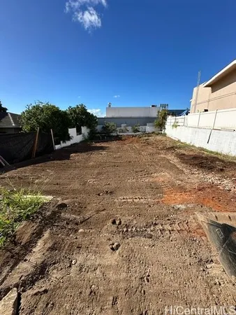 a view of a road with an ocean view