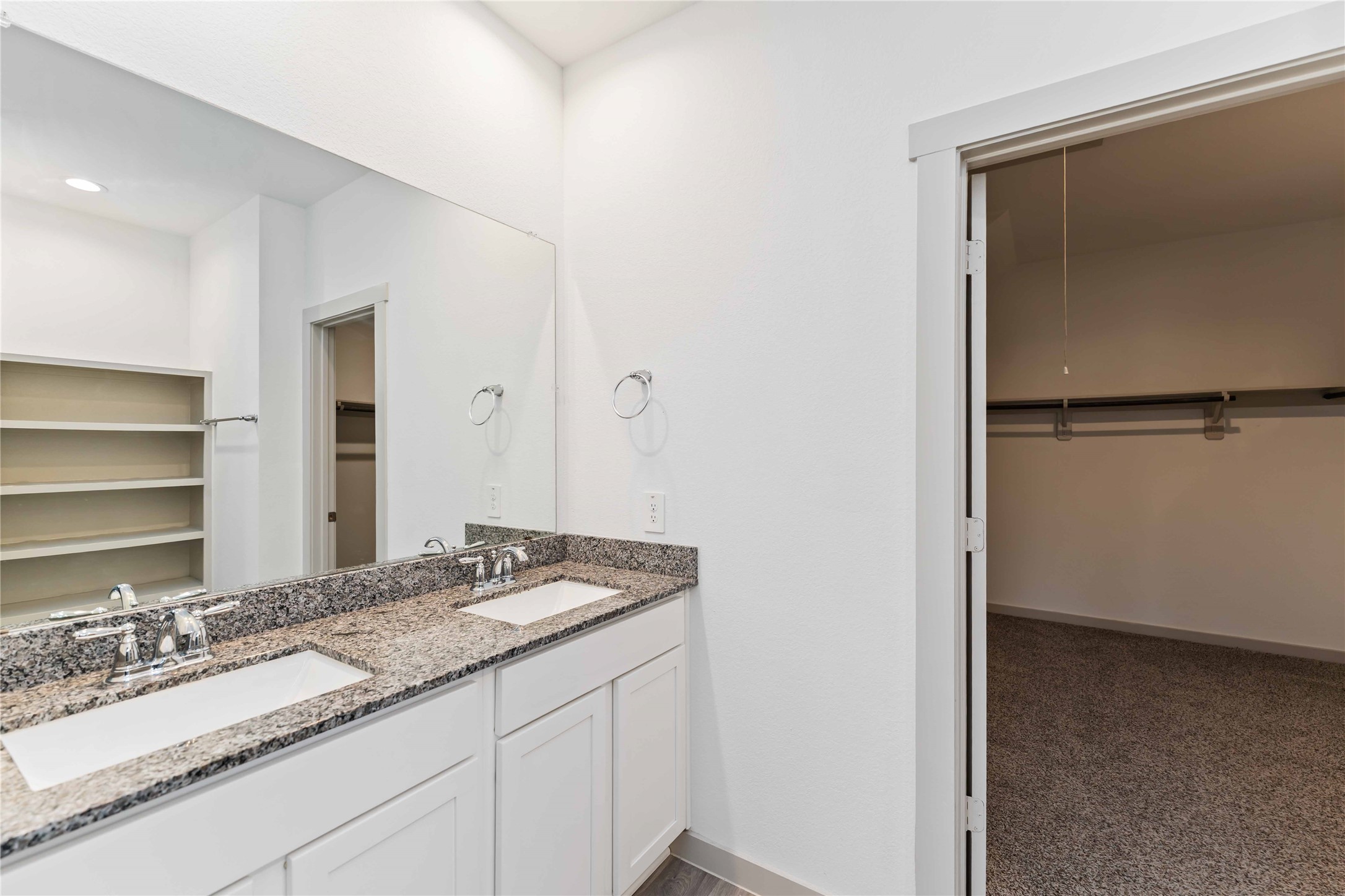 10610 Kings River Drive Rosharon, TX 77583 - Photo 17 of 33 a bathroom with a granite countertop sink and a mirror