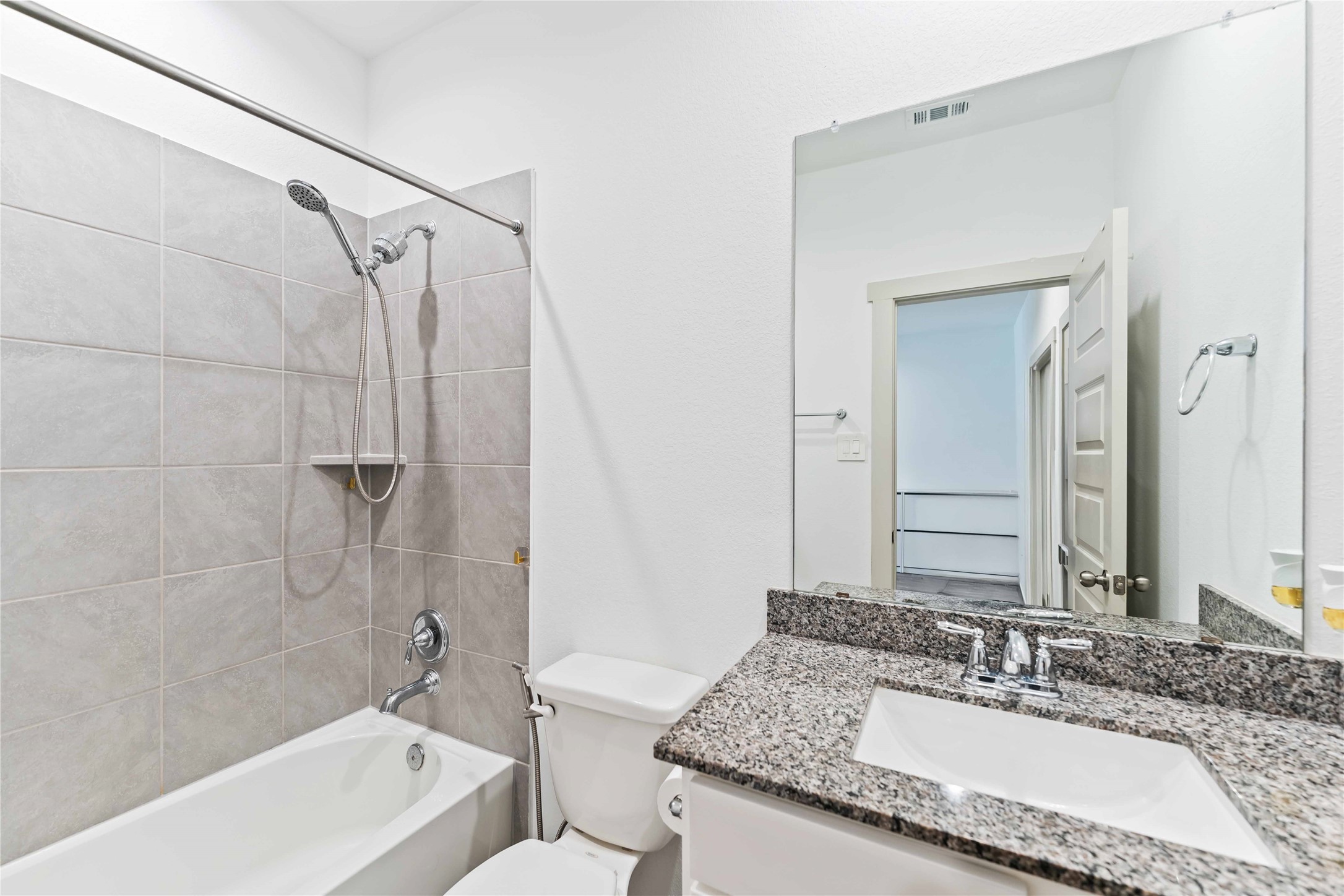 10610 Kings River Drive Rosharon, TX 77583 - Photo 23 of 33 a bathroom with a granite countertop sink a toilet and shower