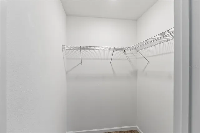 a view of a room with racks on the wall